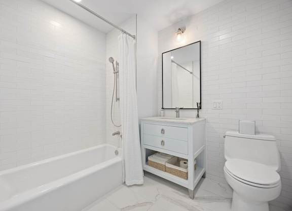 Bathroom with white bathtub at Hudson Piers, Yonkers, 10701