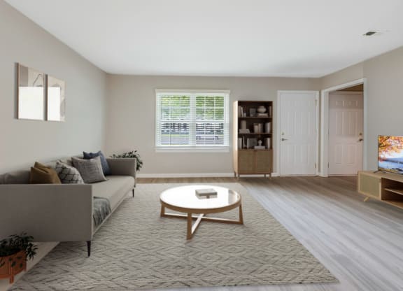 a living room with a couch and a coffee table