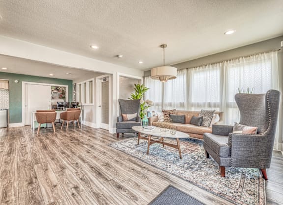 Open living space with wood style flooring at Northwood Heights Apartments, Dallas, 75248