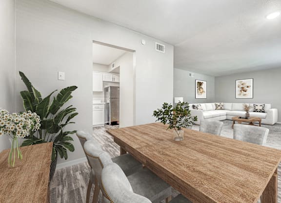 Open dining area with wood tone table at Northwood Heights Apartments, Dallas