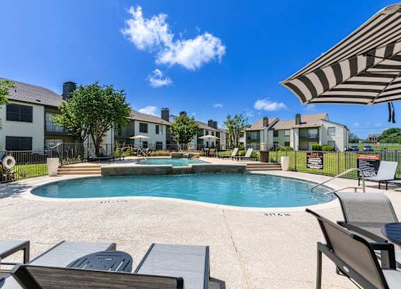 Pool With Lounge Chairs at Leander, Texas
