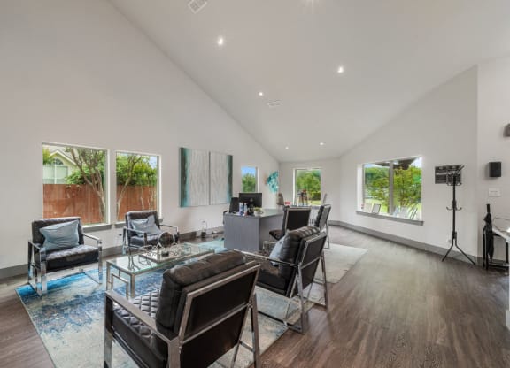 a living room with couches and chairs and a table  at Shadow Ridge, Arlington, 76013