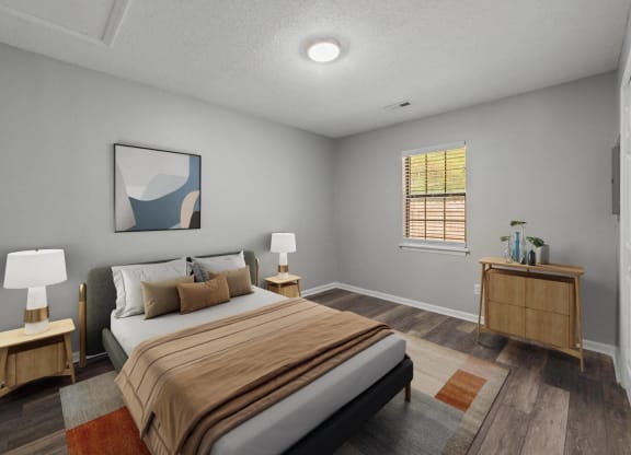 a bedroom with a bed and a window at Bennett, Greenville, NC