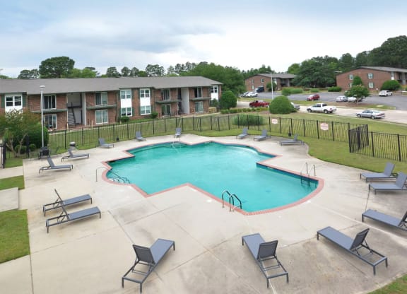pool with poolside seating at channing apartments in fayetteville nc