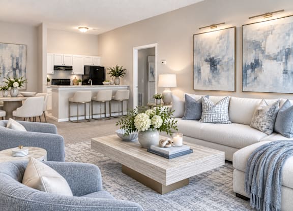A modern living room with a grey and white color scheme.