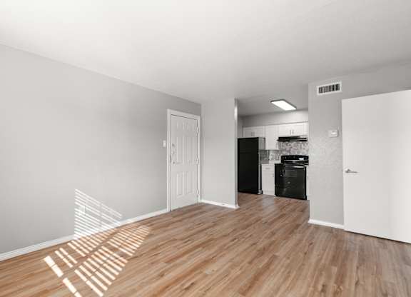 A room with wooden floors at The Sidney, Texas, 75090