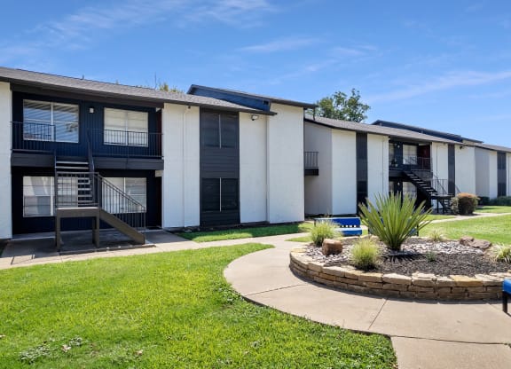 our apartments are located in a quiet neighborhood with grass