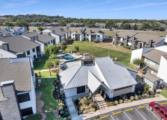 an aerial view of a group of houses in a neighborhood