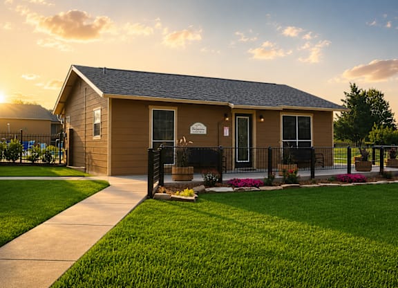 Single story clubhouse building with front porch at Ridgeview Apartments, Sherman, 75092