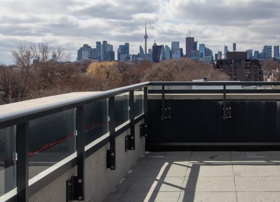 the view of the city from the top of a bridge
