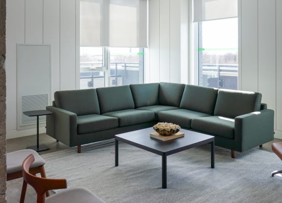 a living room with couches and a coffee table