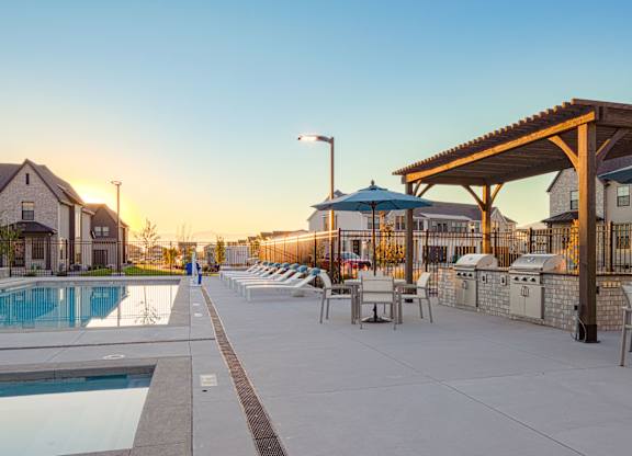A sunny day at the pool with a clear blue sky.