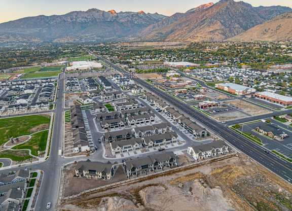 A suburban area with a mountain in the background.