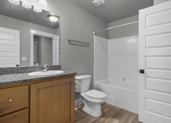 a bathroom with a toilet and a sink