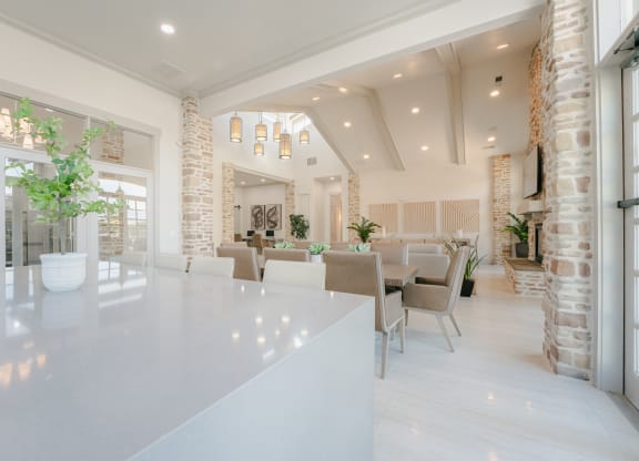 the kitchen and dining room of a house at Aldara Apartments in Saratoga Springs, Utah