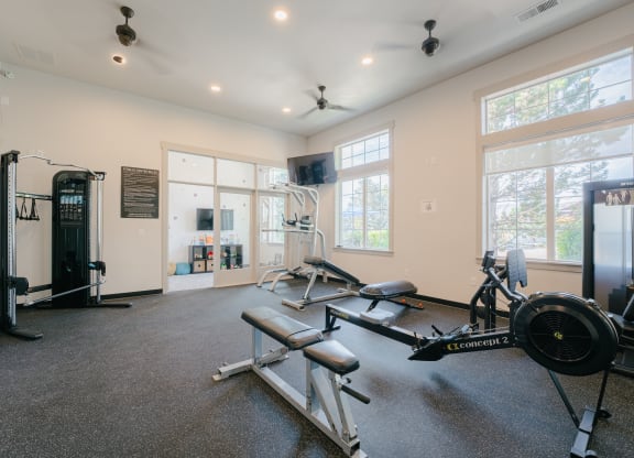 the gym with weights and cardio equipment at Aldara Apartments in Saratoga Springs, Utah