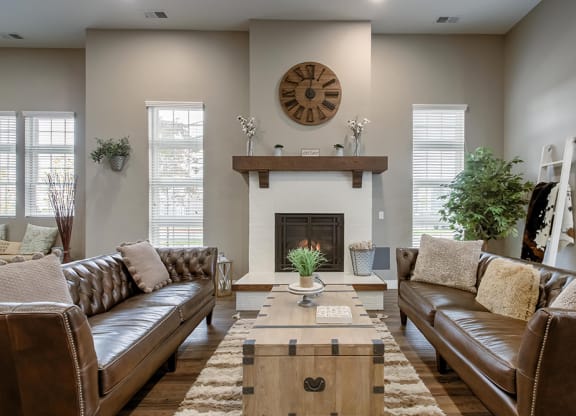a living room with couches and a coffee table