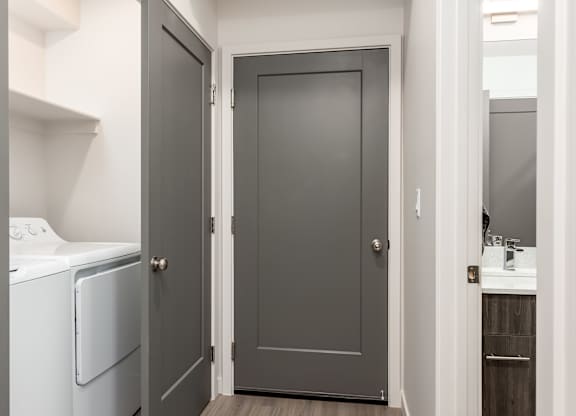A laundry room with a washer and dryer.