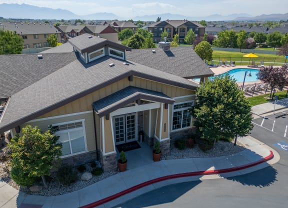 an aerial view of a house with a swimming pool at Aldara Apartments in Saratoga Springs, Utah