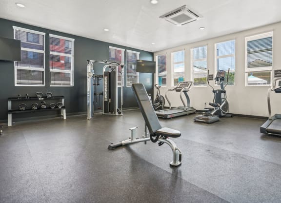 an image of a room with chairs and a geometric wall