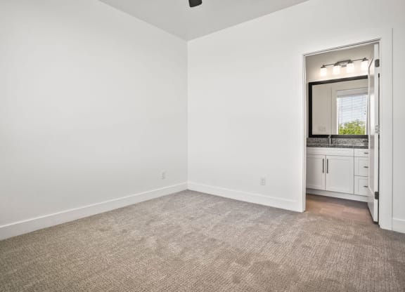 an empty room with a sink and a mirror  at Aero Luxury Townhomes in Layton, Utah