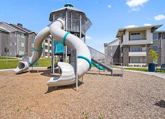 Affinity 56 Apartments for rent in West Jordan, UT  A playground with a slide and a play structure.