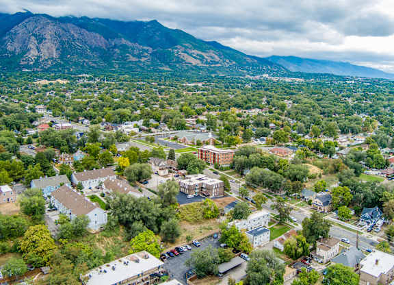A small town with a mountain in the background.