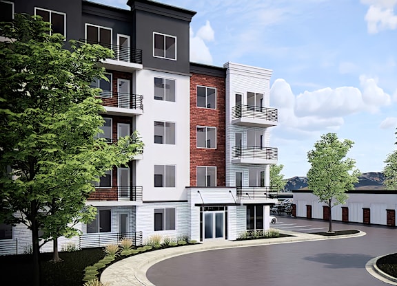 A modern apartment complex with a central courtyard.