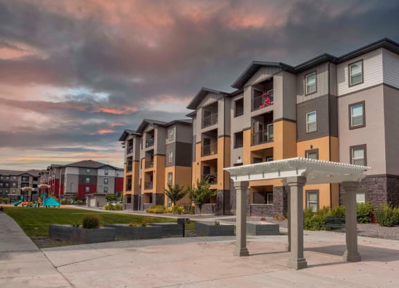 exterior view at dusk at the bradley braddock road station apartments