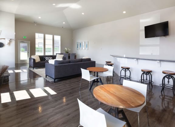 a living room filled with furniture and a fire place