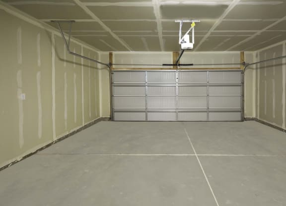two car attached garage at VALO at South Haven Farms townhomes in Payson, UT