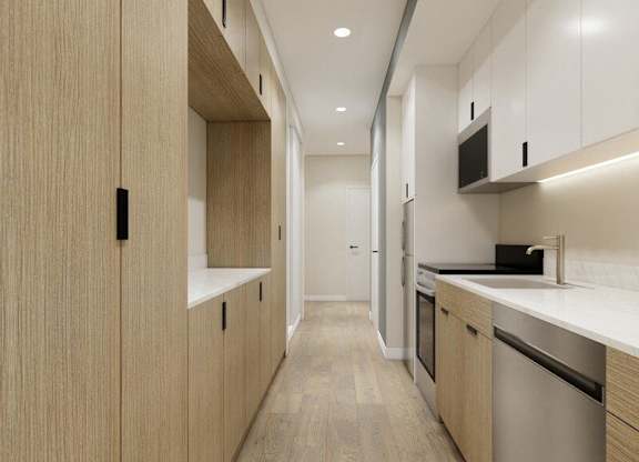 A modern kitchen with wooden cabinets and stainless steel appliances.