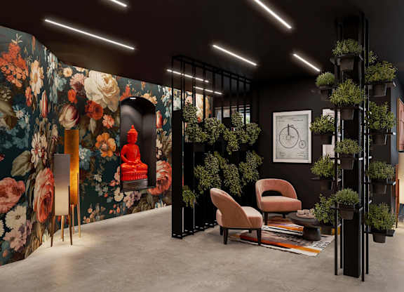 A room with a floral wallpaper and a chair.
