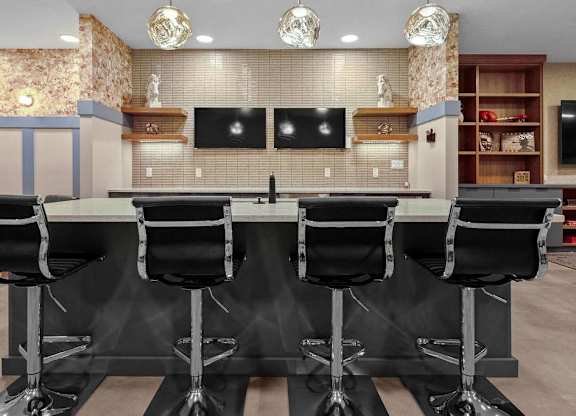 A conference room with a long table and chairs.