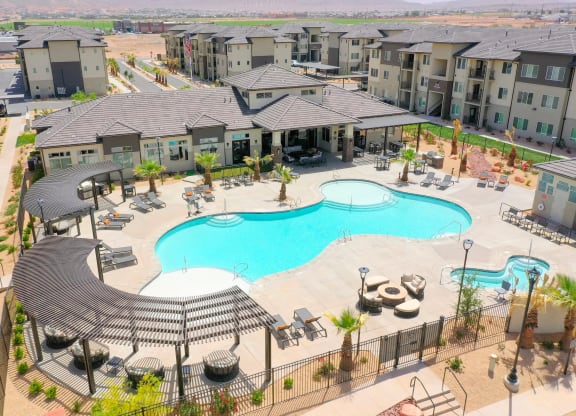an aerial view of a large swimming pool at Brookfield apartments in Saint George, Utah.