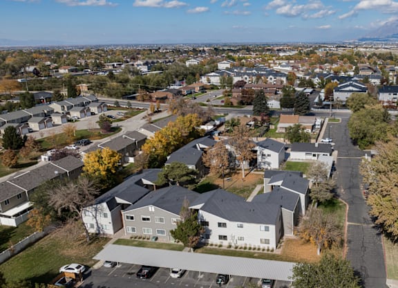 A suburban neighborhood with houses and trees.