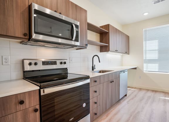 a kitchen with stainless steel appliances