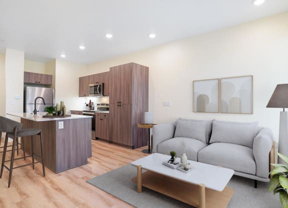 a living area with a grey couch