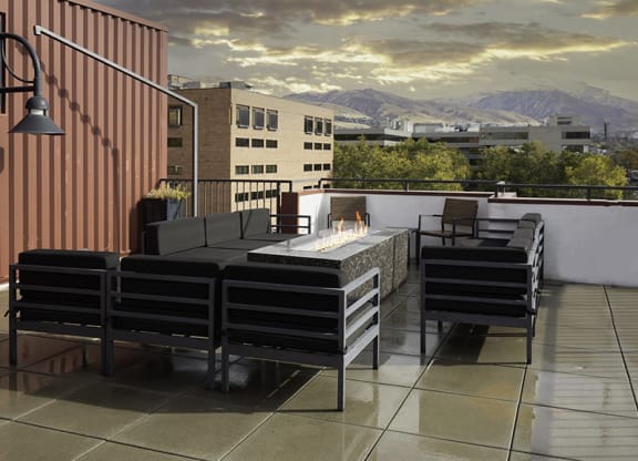 patio with fireplace and seating exterior deck at The Lotus Apartments in Downtown Salt Lake City, Utah