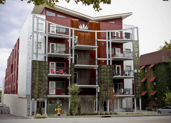 exterior of red brick building at The Lotus Apartments in Downtown Salt Lake City, Utah
