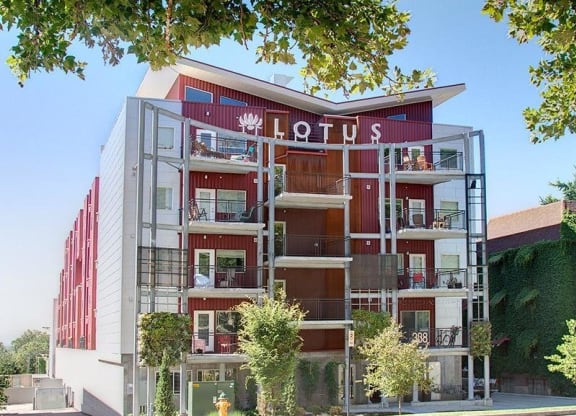 exterior photo of a red brick building at The Lotus Apartments in Downtown Salt Lake City, Utah