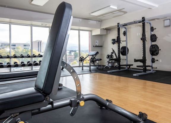 a gym with a squat rack at The Lotus Apartments for rent in Downtown Salt Lake City, Utah