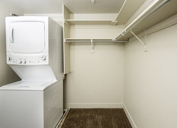 stacked laundry in a closet at The Lotus Apartments in Downtown Salt Lake City, Utah