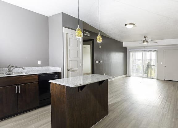 interior photo of a kitchen with hardwood floors from The Lotus Apartments in Downtown Salt Lake City, Utah