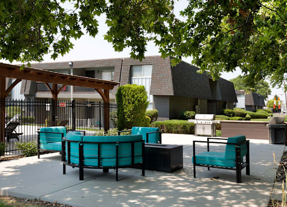 A park with a bench and a table.