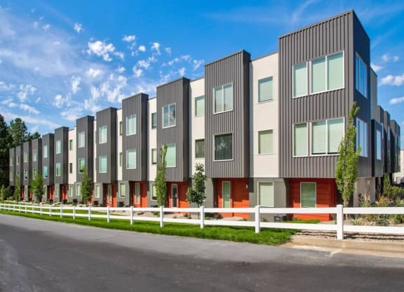 an image of a row of new apartment buildings  at Aero Luxury Townhomes in Layton, Utah
