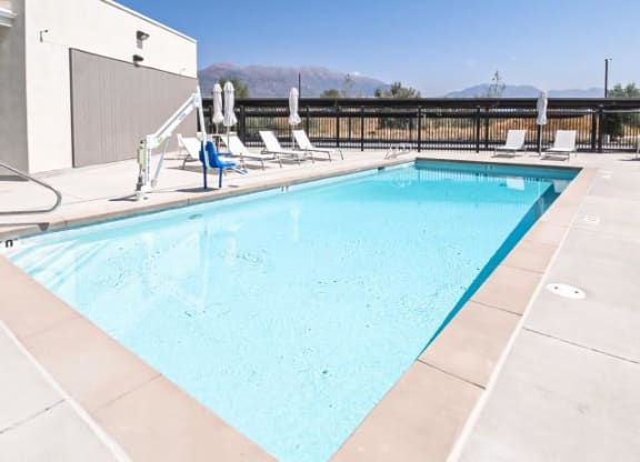 a large pool of water sitting next to a building