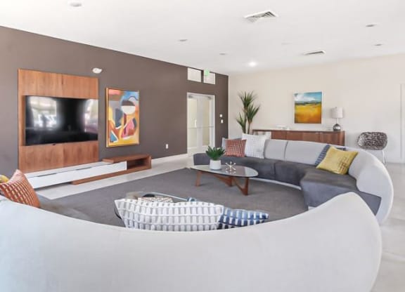 a living room with a couch and a television