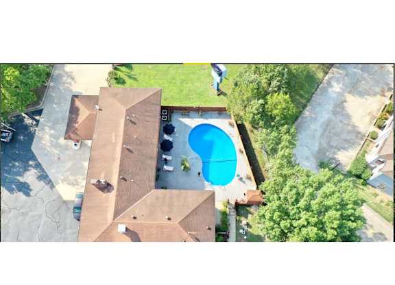 an overhead view of a swimming pool on top of a roof at Schaefer Ridge Apartments, Missouri