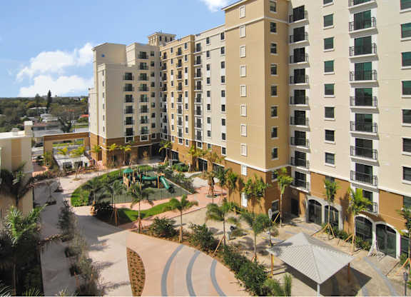 A large building with a courtyard in the middle.